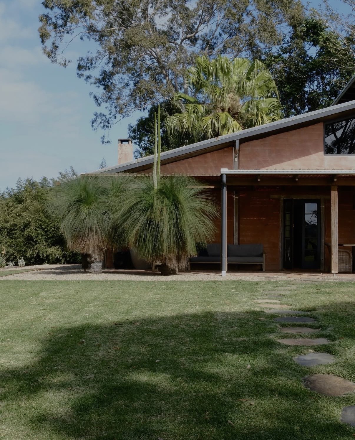 The house at The Perch with a native grass tree